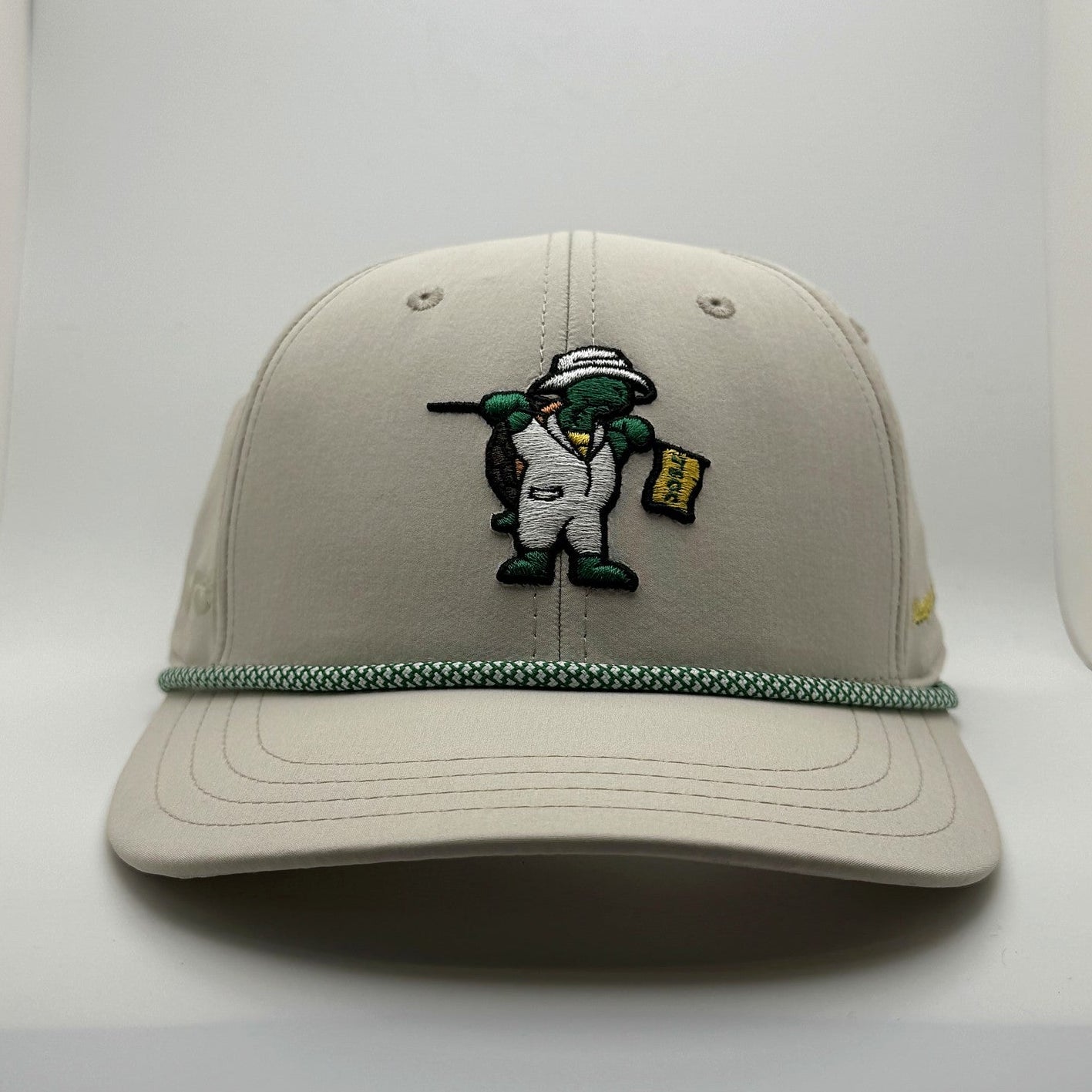 Stone golf snapback hat with terrapin caddy logo and forest green rope, front